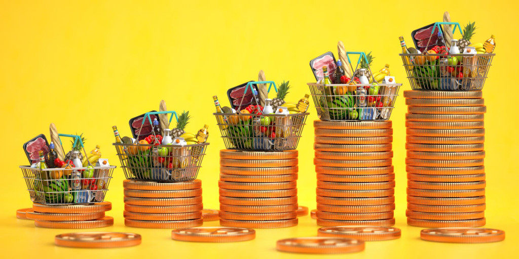 &lt;p&gt;web-cijene, 16.1.2023.&lt;br&gt;
Growth of food sales or growth of market basket or consumer price index concept. Shopping basket with foods with coin stacks on yellow background. 3d illustration&lt;/p&gt;