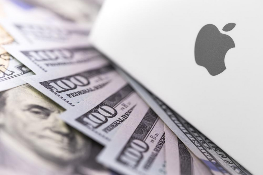 &lt;p&gt;Apple logo on box, dollars. Apple is a multinational technology company that designs, develops, sells electronics, computer software, online services. Ekaterinburg, Russia - February 28, 2018&lt;/p&gt;