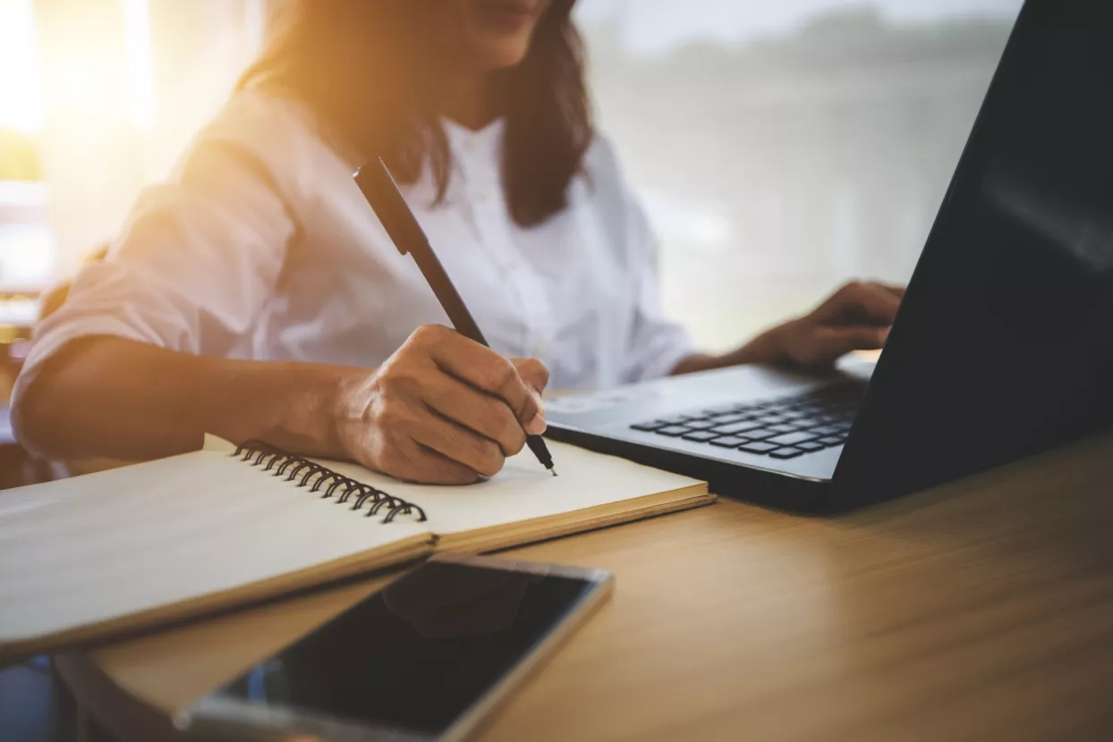 young woman with learning language during online courses using netbook