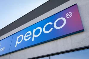 KRZESZOWICE, POLAND - OCTOBER 23, 2022 Pepco store with brand logo sign board hanging above entrance door. European chain of discount shops, rebrand signboard with new rebranding logotype.
