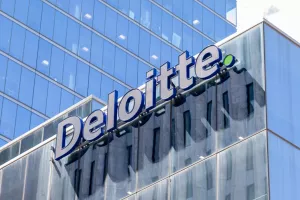 Toronto, Canada - June 19, 2018: Deloitte sign on the national office building is seen in Toronto. Deloitte (Deloitte Touche Tohmatsu Limited) is a British professional services network. 