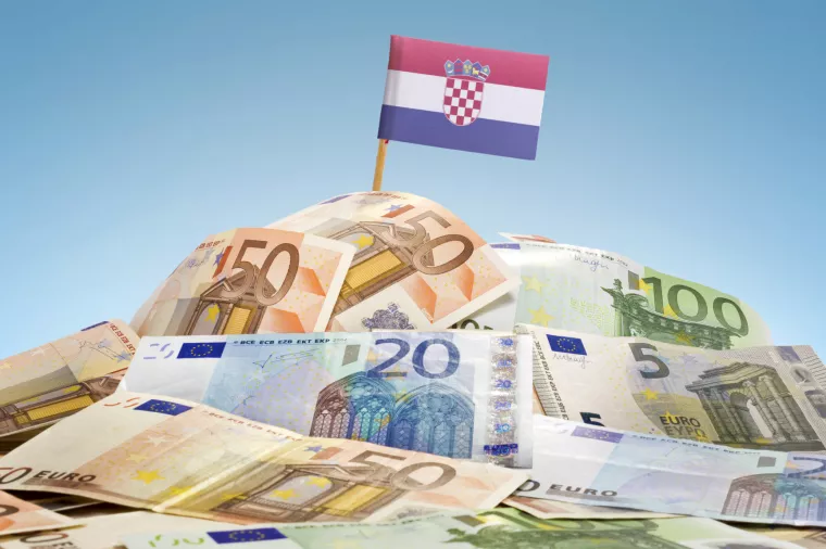3-rast BDP-a-The national flag of Croatia sticking in a pile of mixed european banknotes.(series)