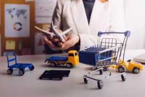 Entrepreneurs Small Business SME Independent men work at home Use smartphones and laptops for commercial checking, online marketing, packing boxes, SME sellers, concept, e-commerce team, online sales